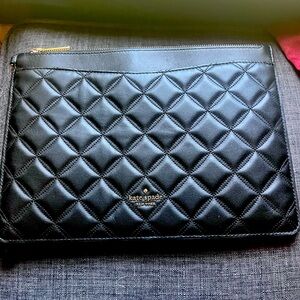 Kate Spade large black clutch with wrist holder. Practically brand new.